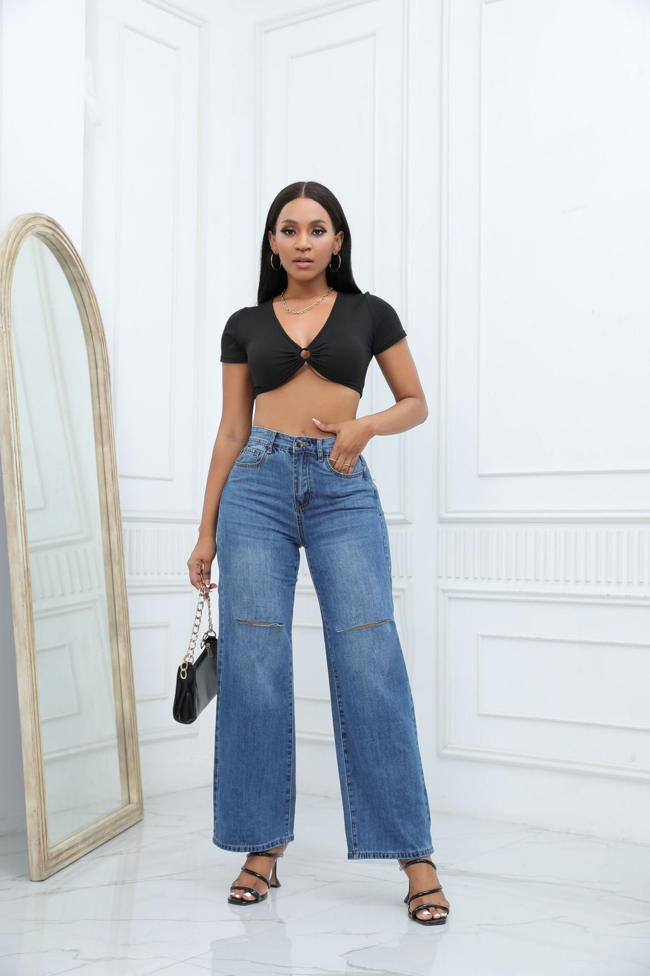 Women's mid-waist loose ripped bell-bottom jeans