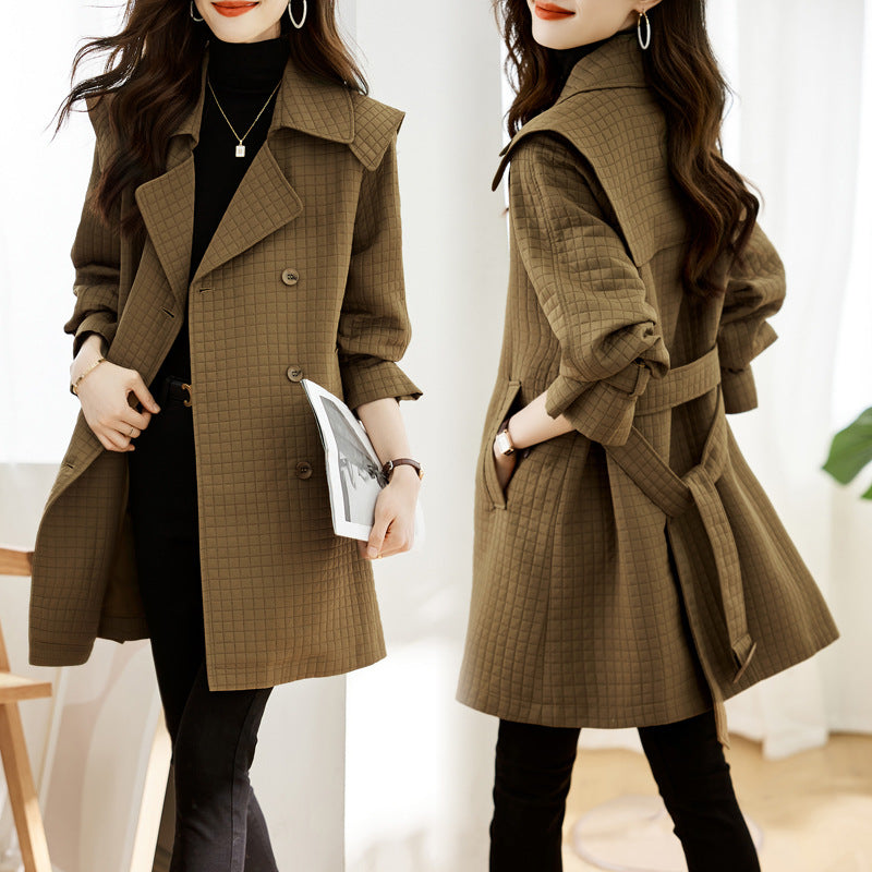 Women's mid-length waffle trench coat with lapel collar and belt