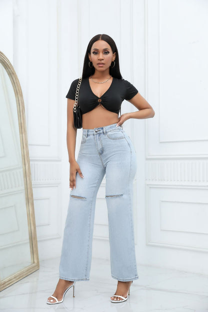 Women's mid-waist loose ripped bell-bottom jeans