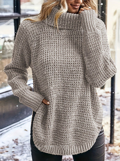 Women's oversized turtleneck knit sweater with side split