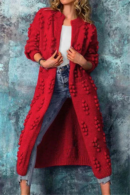 Women’s long knitted pom-pom cardigan