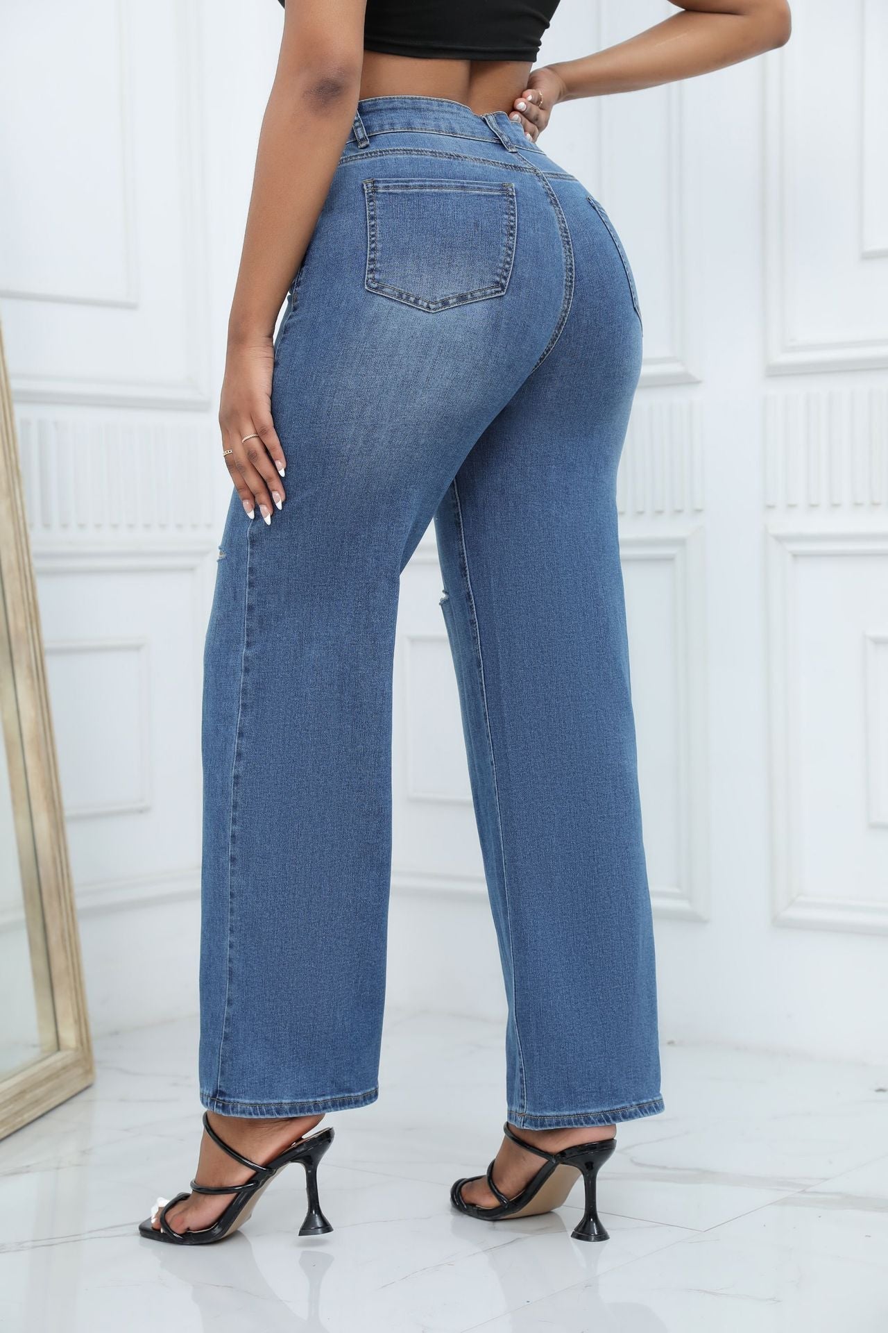 Women's mid-waist loose ripped bell-bottom jeans