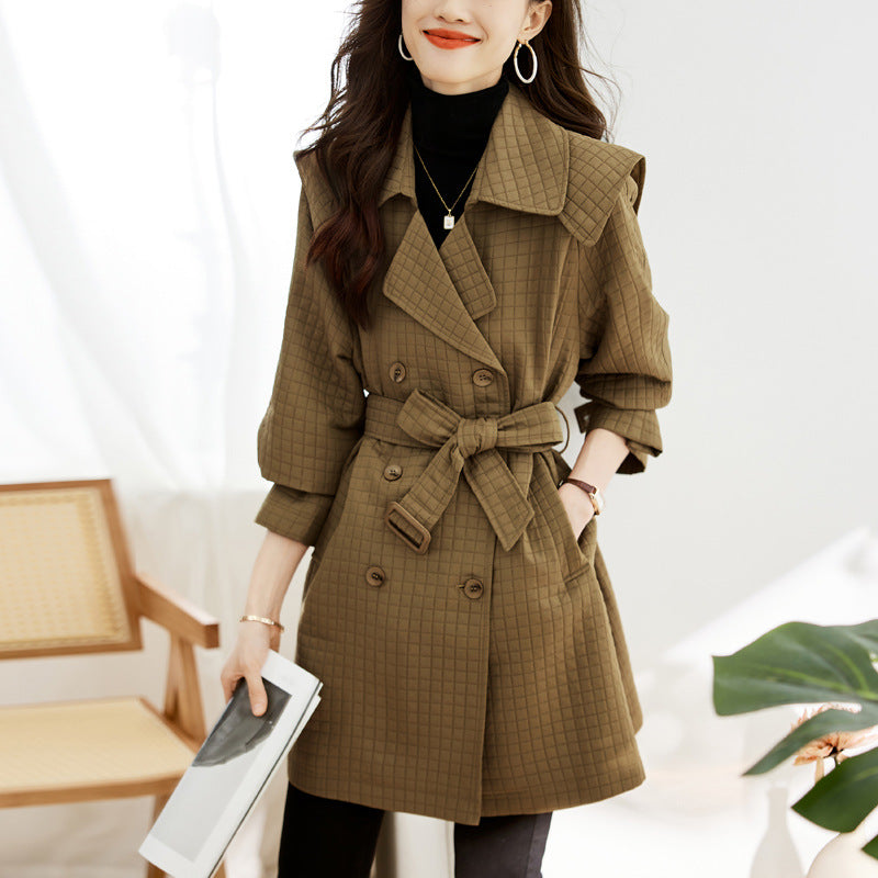 Women's mid-length waffle trench coat with lapel collar and belt