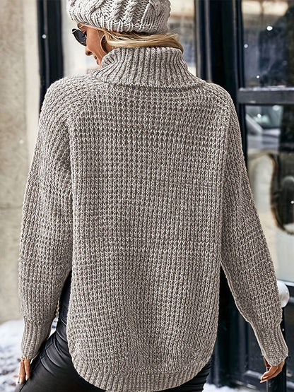 Women's oversized turtleneck knit sweater with side split