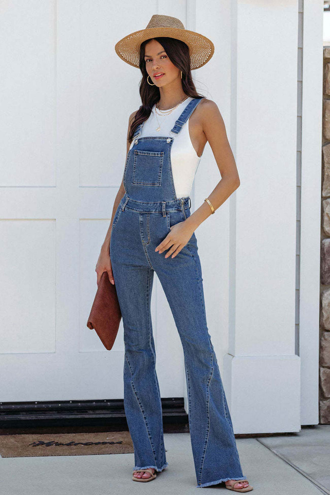 Kairi - open-back flared denim jumpsuit