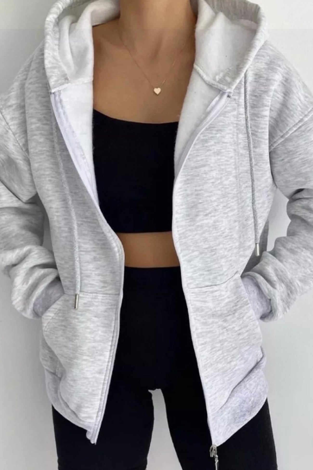 Women's oversized solid zip-up hoodie with pockets