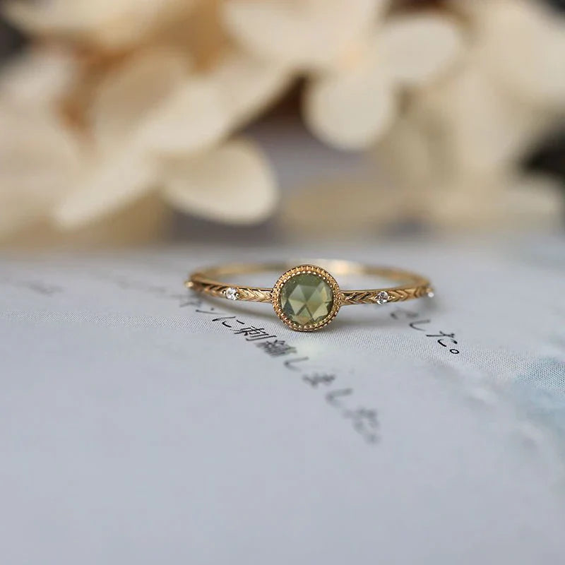 Adjustable green crystal ring