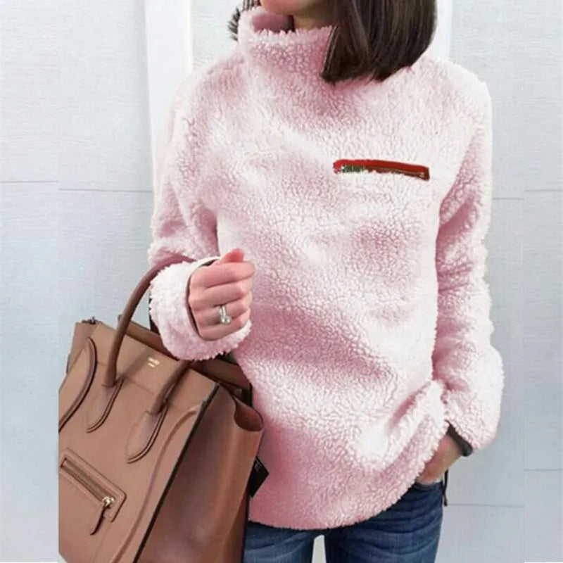 Woman's turtle neck sweater with stylish zipper pocket