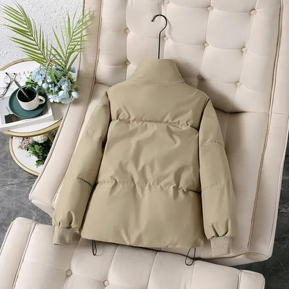 Women's winter puffer jacket with a stand collar