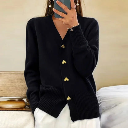 Women's long-sleeved v-neck cardigan sweater with button details