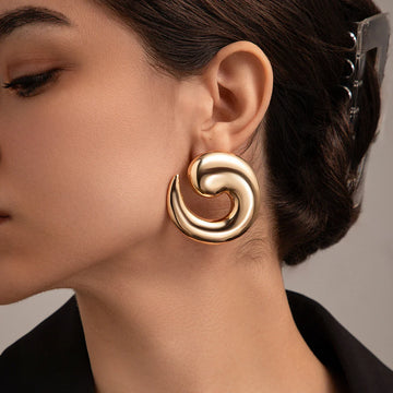 Pietra - oversized shell snail stud earrings