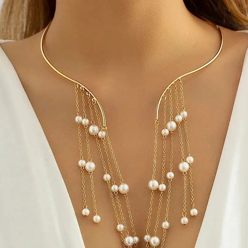 Elegant gold chain collar necklace with pearl drop accents