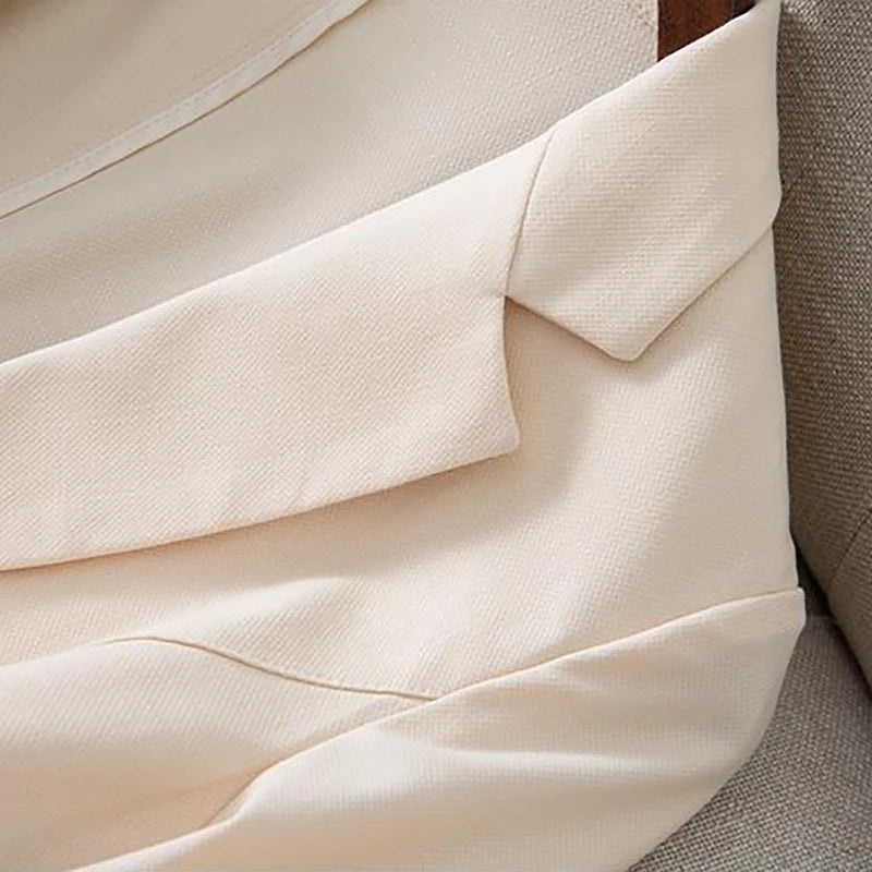 Women's double-breasted blazer with button detailing