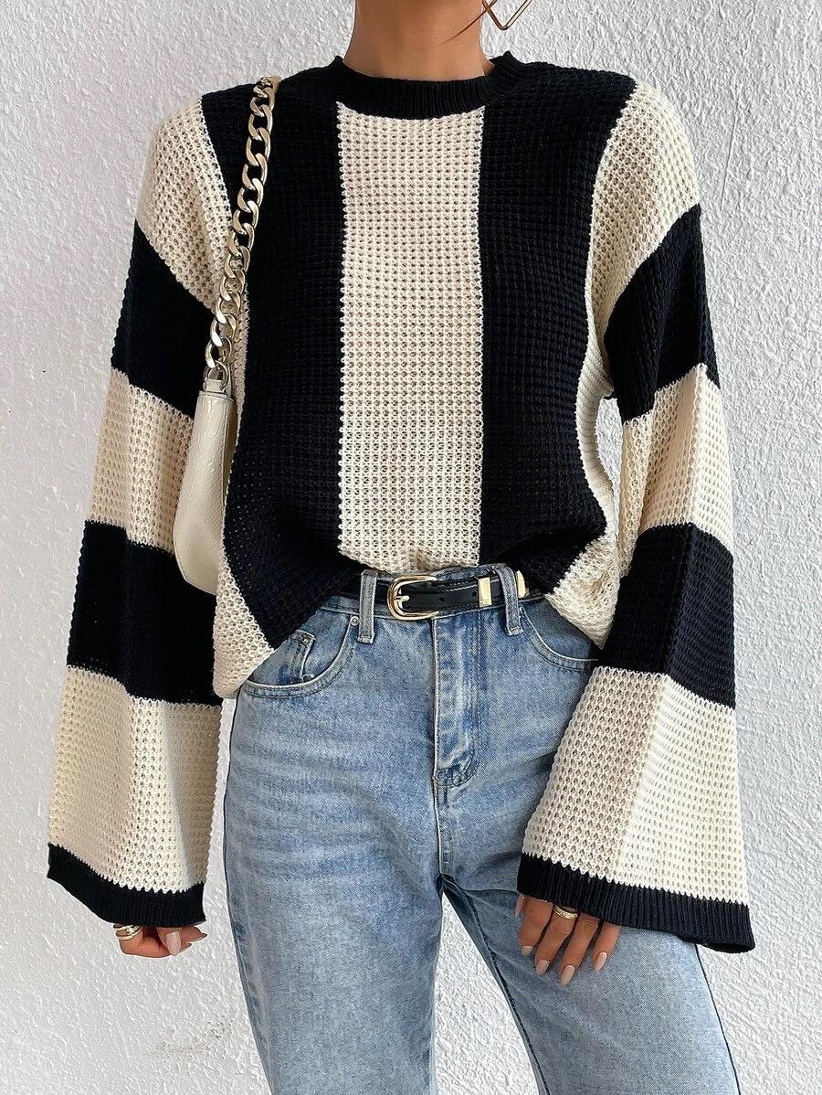 Women's striped sweater in black and white