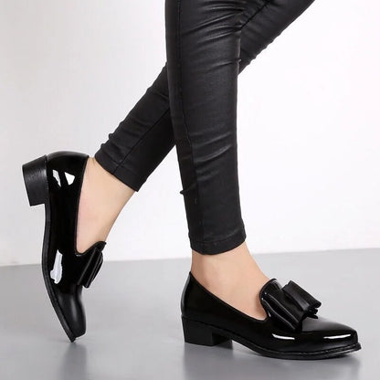 Women's elegant glossy slip-on flats with bow accent