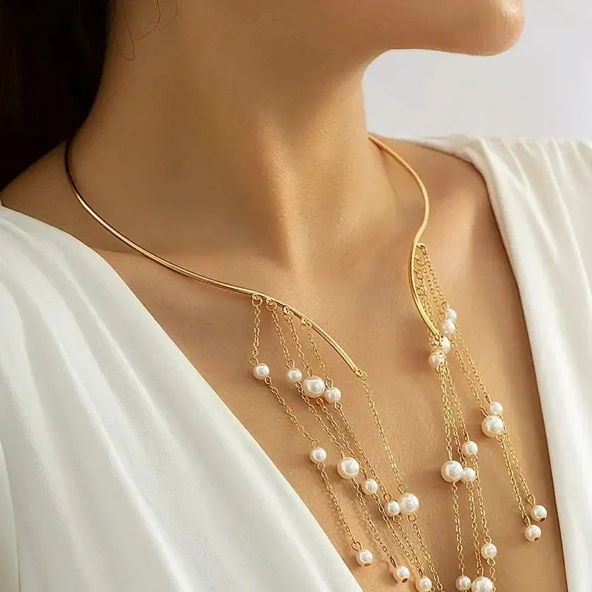 Elegant gold chain collar necklace with pearl drop accents