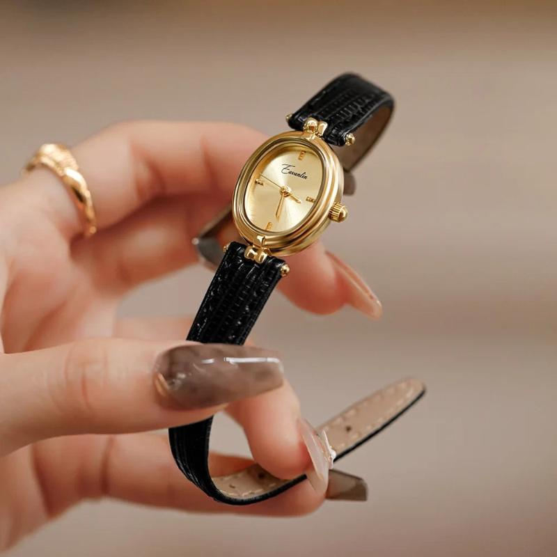 Isla Embossed Oval Wristwatch | Gold-Tone Slim Strap Wristwatch