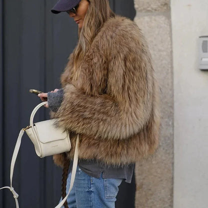 Women's plush faux fur coat perfect for winter, cozy and stylish outerwear