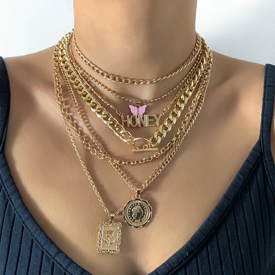 Gold layered chain necklace set with "Honey" pendant