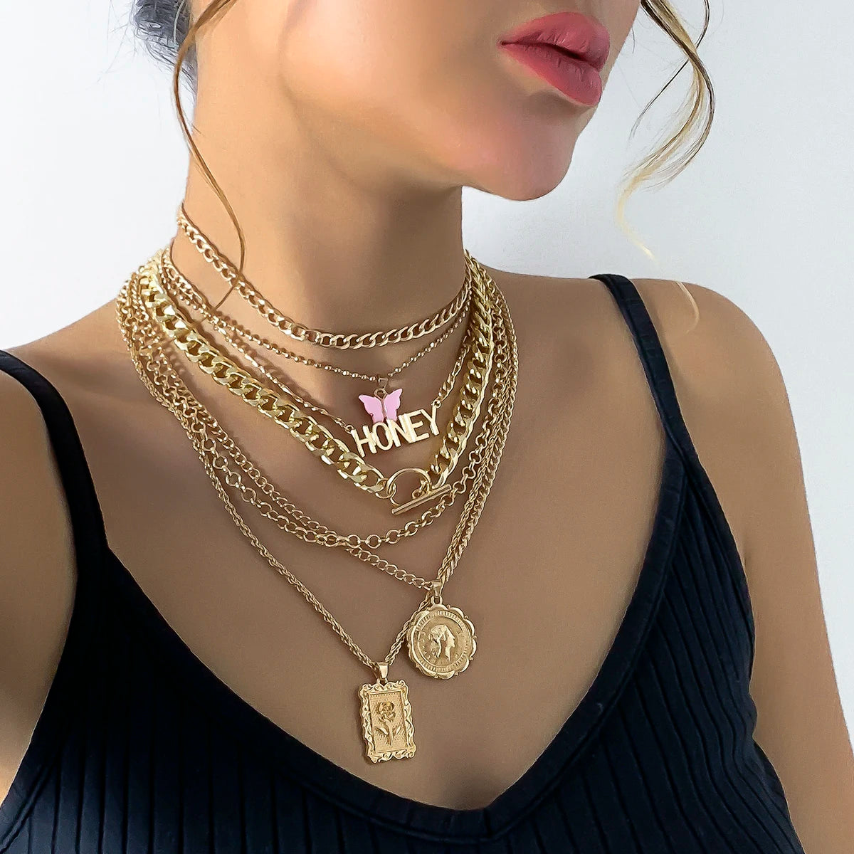Gold layered chain necklace set with "Honey" pendant
