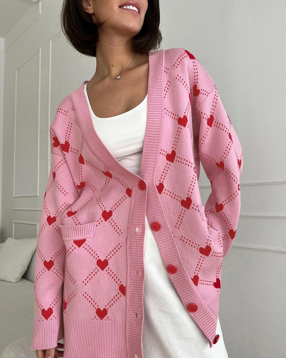 Women's knitted cardigan with heart print and buttons