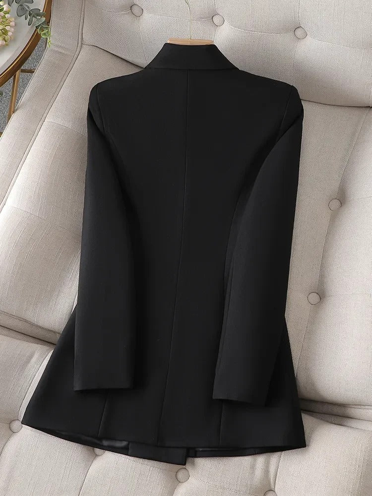 Women's elegant long blazer with pearl closure