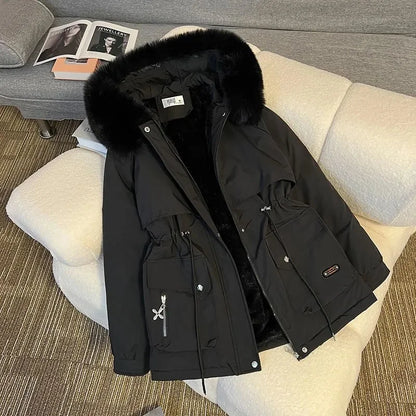 Women's thick warm hooded winter parka with snow padding