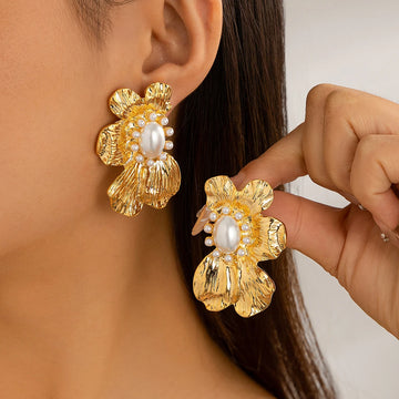 Floral statement earrings with a pearl center