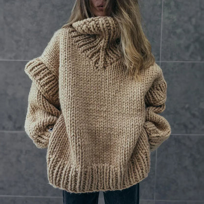 Women's chunky knit turtleneck sweater with stylish sleeves