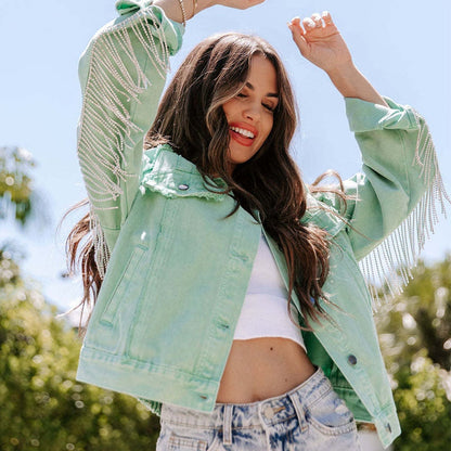 Women's denim jacket with glitter fringes