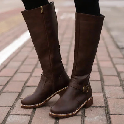 Women's high-top biker boots with chunky heel and buckle design