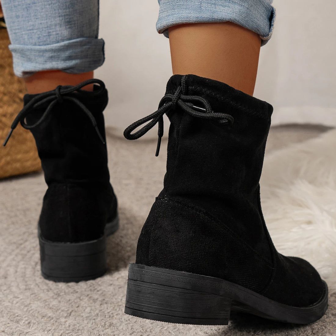 Women's low heel ankle boots with drawstring closure