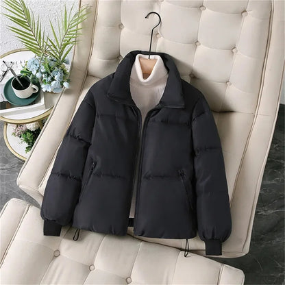 Women's winter puffer jacket with a stand collar