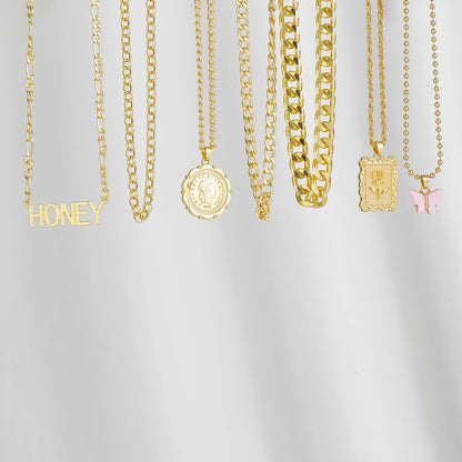 Gold layered chain necklace set with "Honey" pendant