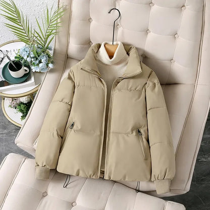 Women's winter puffer jacket with a stand collar