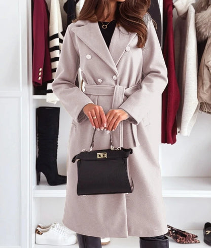 Elegant women’s double-breasted coat with tie closure