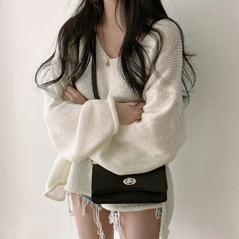 Women's vintage loose v-neck slit rolled edge sweater