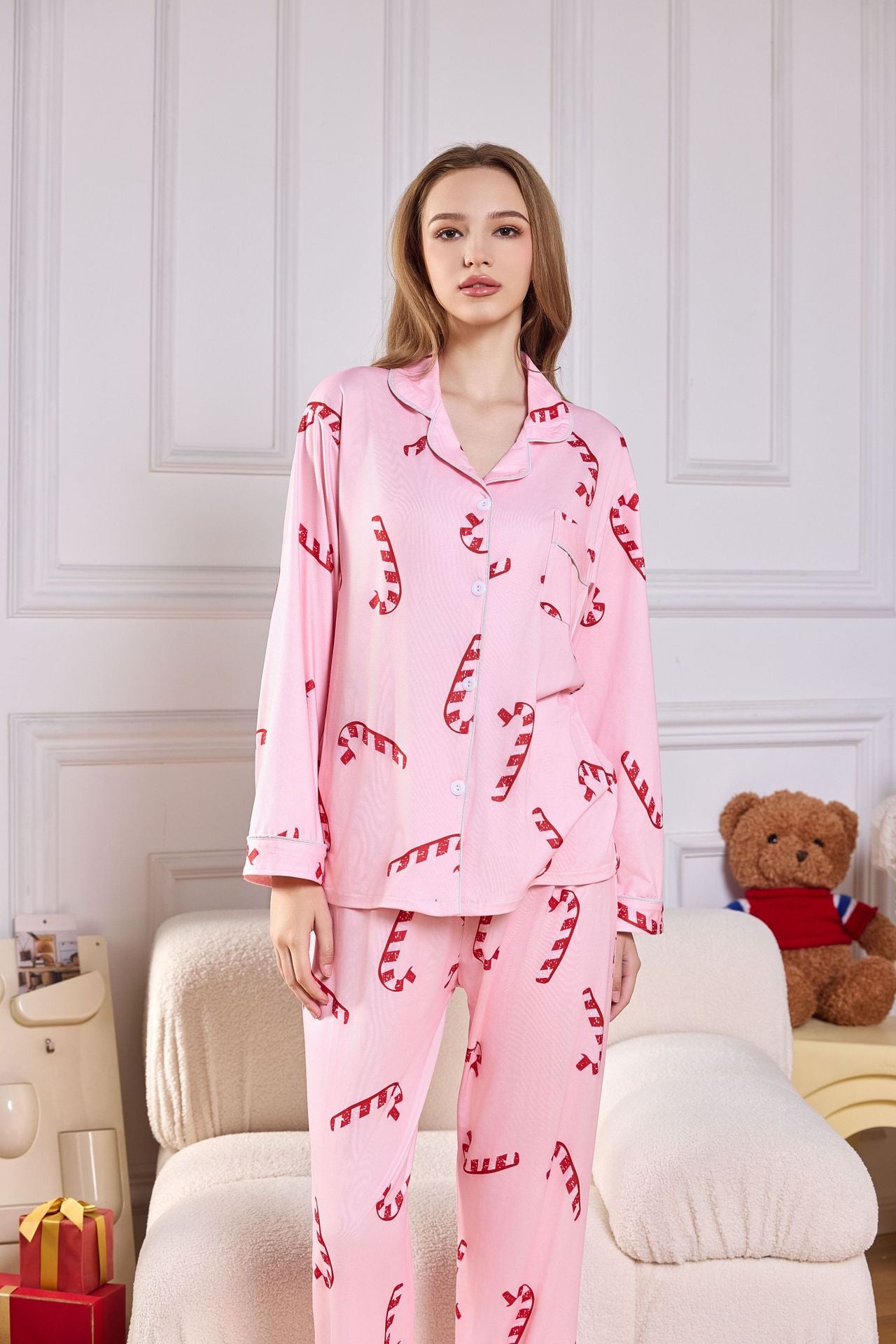 Women's holiday pajama set with festive candy cane and snowman print