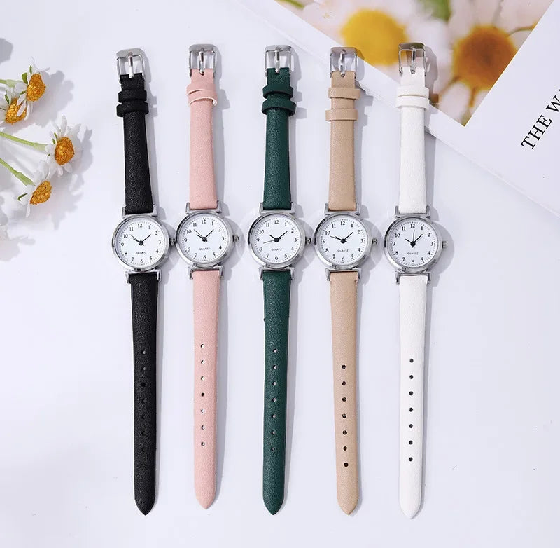 Classic round quartz women's wristwatch with minimalist leather strap