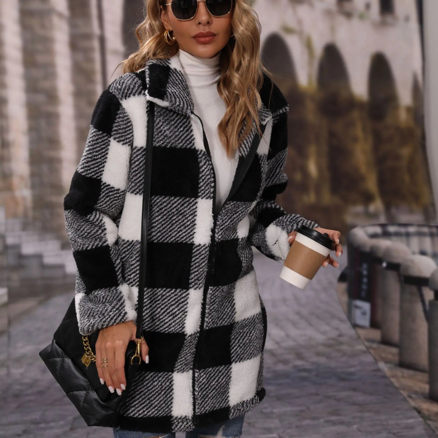 Women's black and white checkered long coat with lapel and zipper