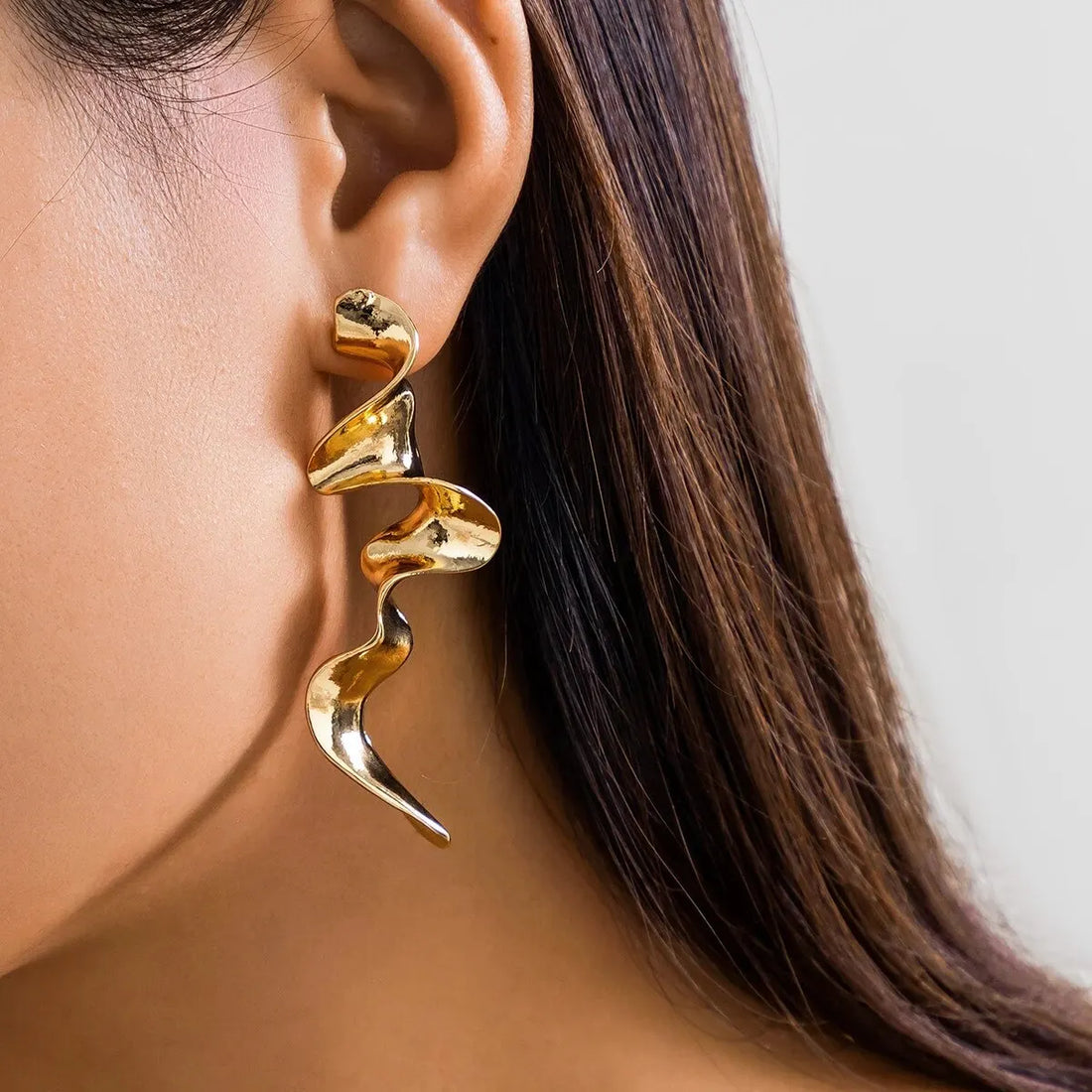 Stylish statement spiral drop earrings