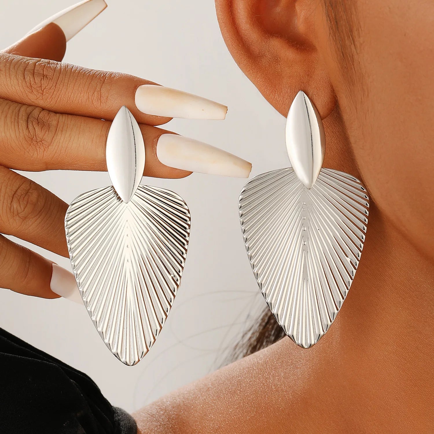 Textured leaf drop earrings