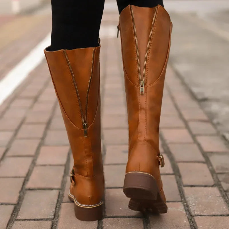 Women's high-top biker boots with chunky heel and buckle design