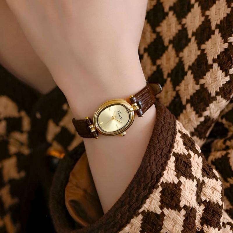 Isla Embossed Oval Wristwatch | Gold-Tone Slim Strap Wristwatch