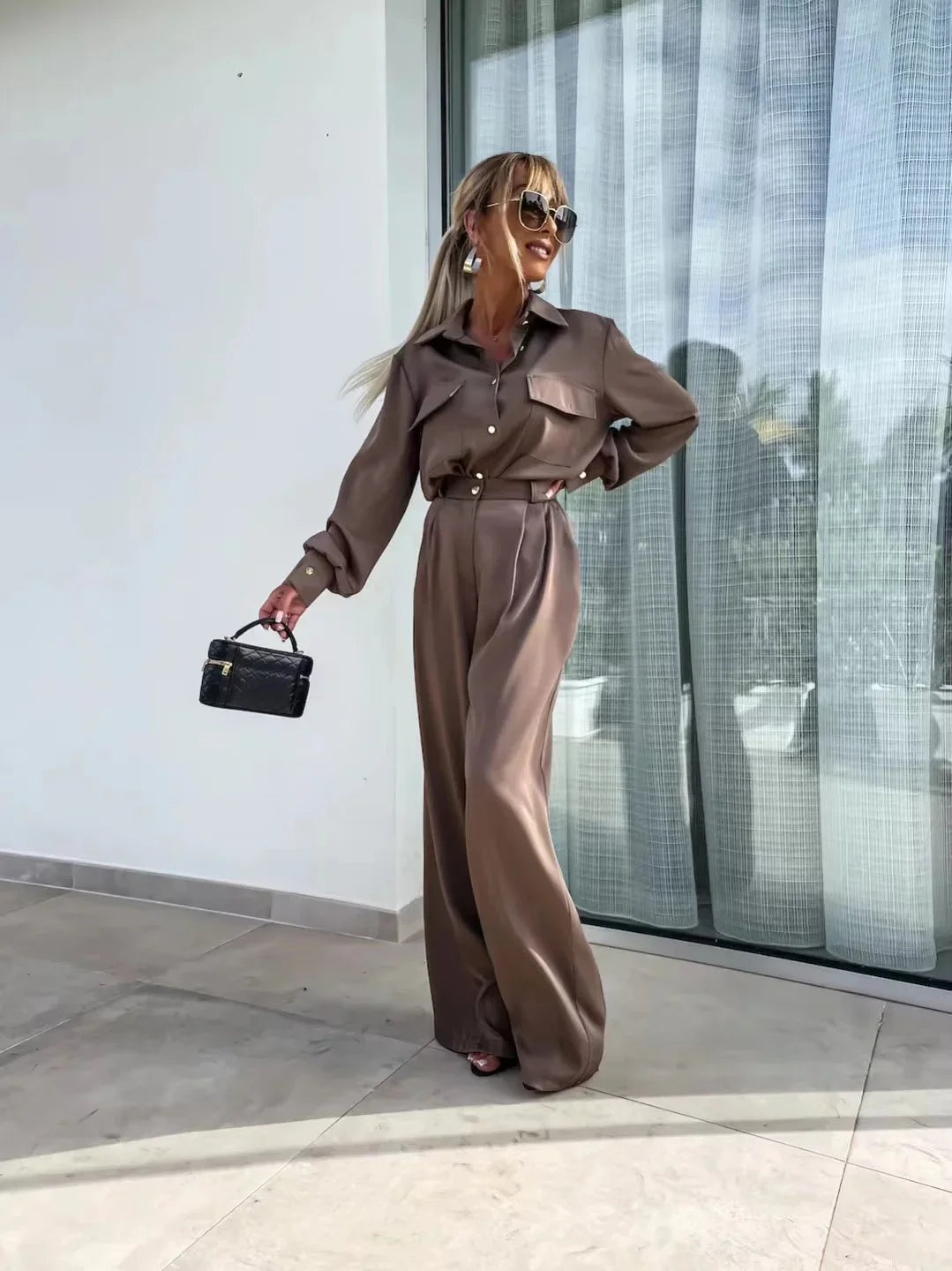 Elegant two-piece satin suit for women