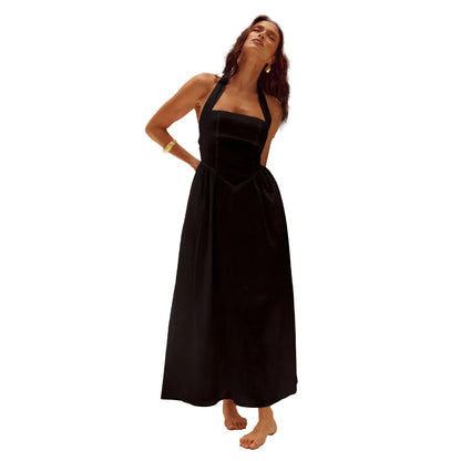 Women's halter neck backless dress with A-line midi skirt