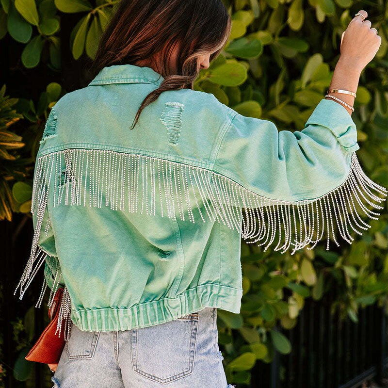 Women's denim jacket with glitter fringes