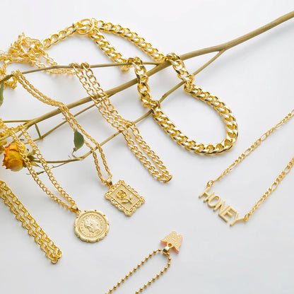 Gold layered chain necklace set with "Honey" pendant
