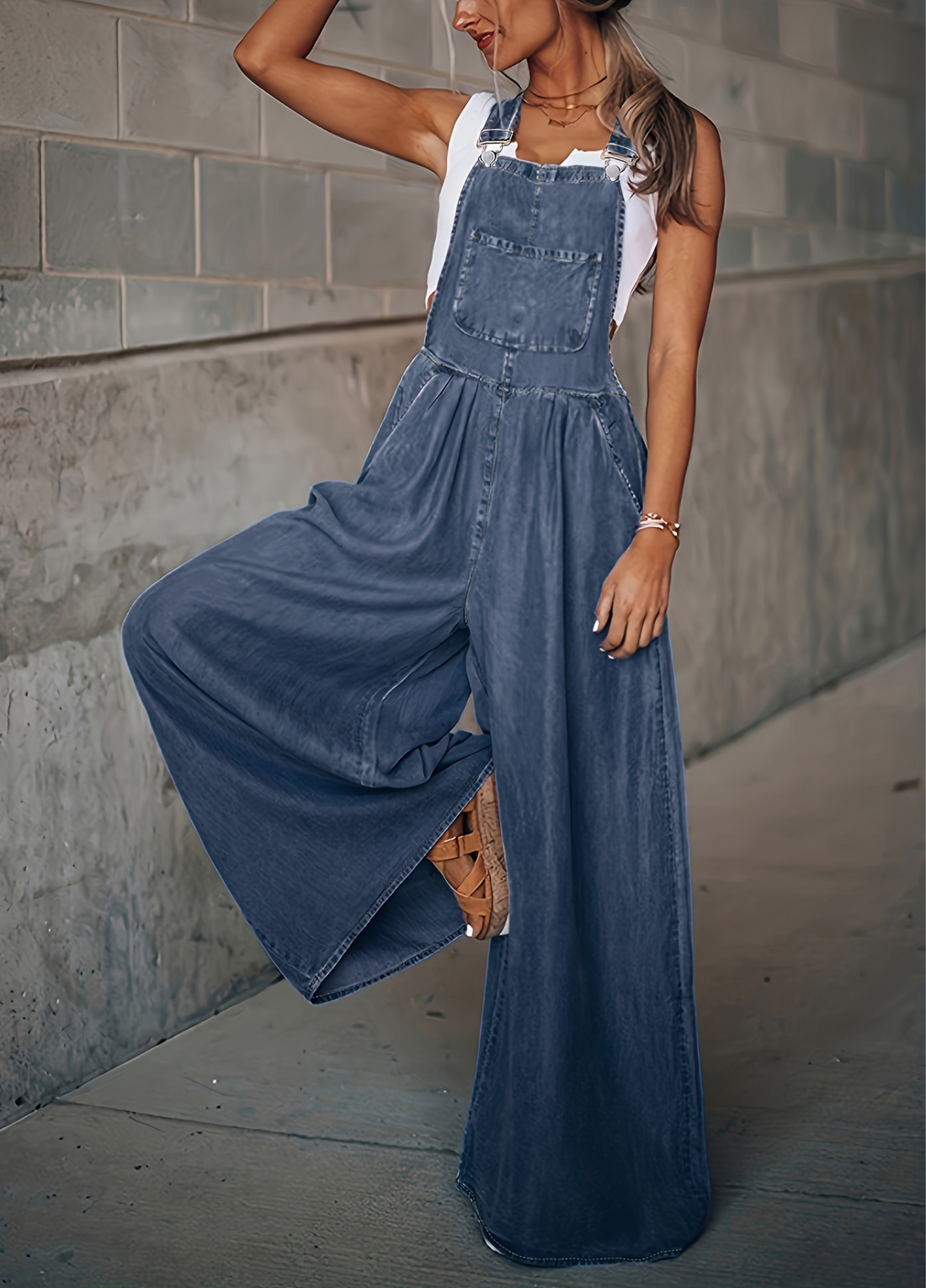 Loose side pocket sleeveless denim jumpsuit with adjustable straps for women