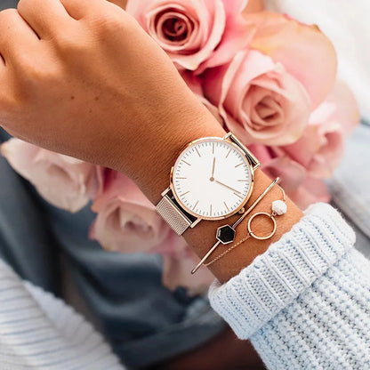 Minimalist mesh band quartz watch with ultra-slim dial for women